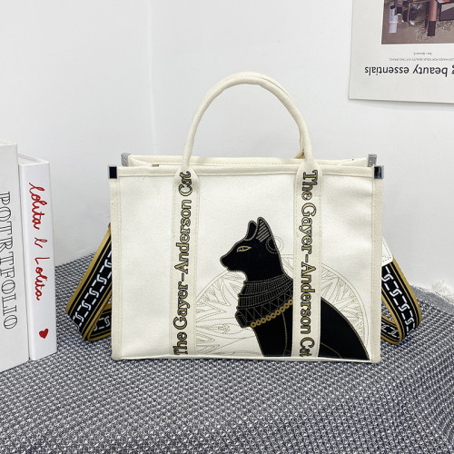 大容量帆布包包女2025春季新款休閒簡約通勤斜後背包時尚手提托特包