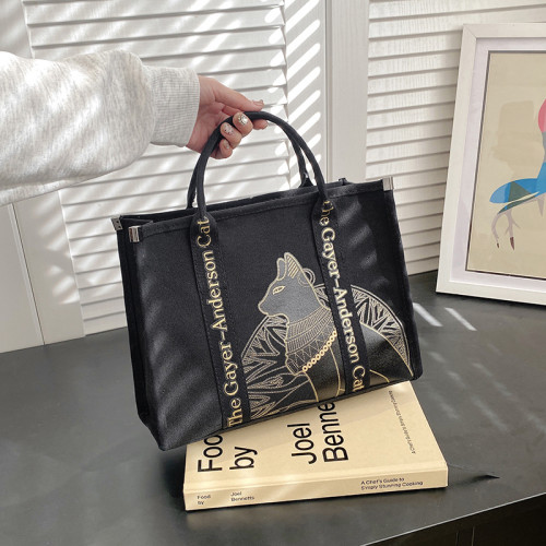 大容量帆布包包女2025春季新款休閒簡約通勤斜後背包時尚手提托特包