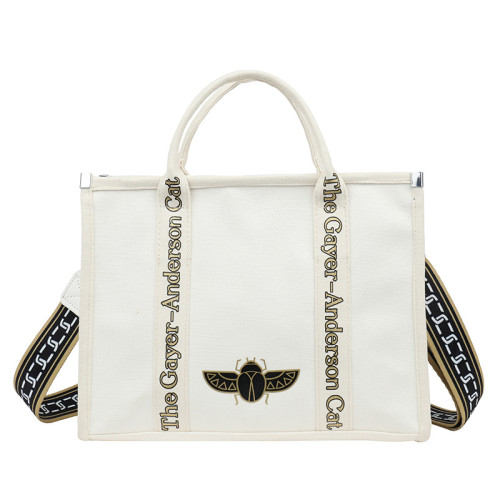 大容量帆布包包女2025春季新款休閒簡約通勤斜後背包時尚手提托特包