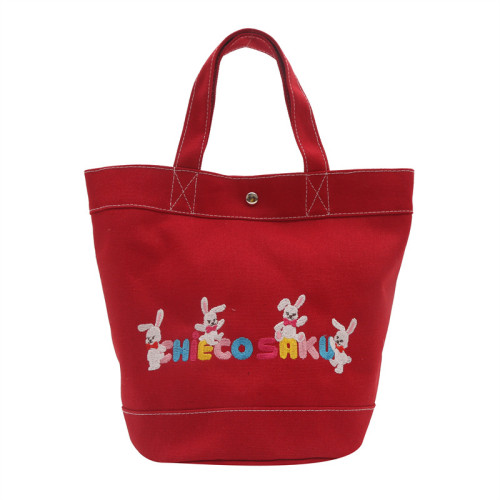 日系新款帆布包印刷卡通字母手提水桶包大容量飯盒包上班族後背包 日系新款帆布包印刷卡通字母手提水桶包大容量飯盒包上班族後背包