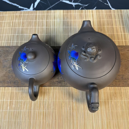 500ml仙桃變色鳳鳴壺遇熱變色紫砂壺西施壺一壺兩盃出水鳥叫可log